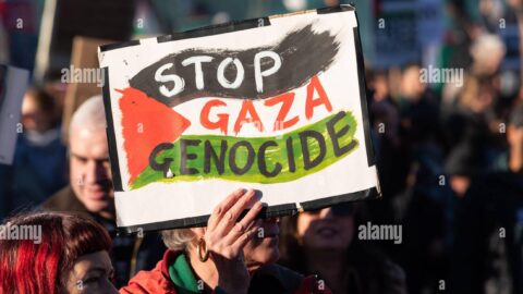 pro palestine rally national demonstration for palestine taking place on armistice day in london uk crossing vauxhall bridge stop gaza genocide 2T8E1JR